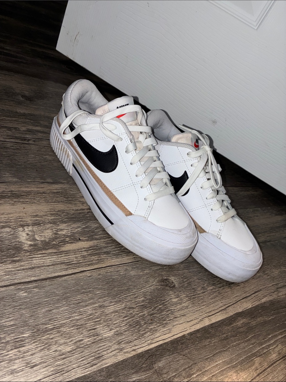 Nike women’s White Black and Tan Platform Sneakers